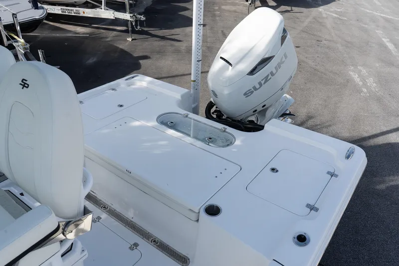 Slide: The Image of 2026 Sea Pro 250 Bay boat with Suzuki outboard motor, rear deck view. - 6