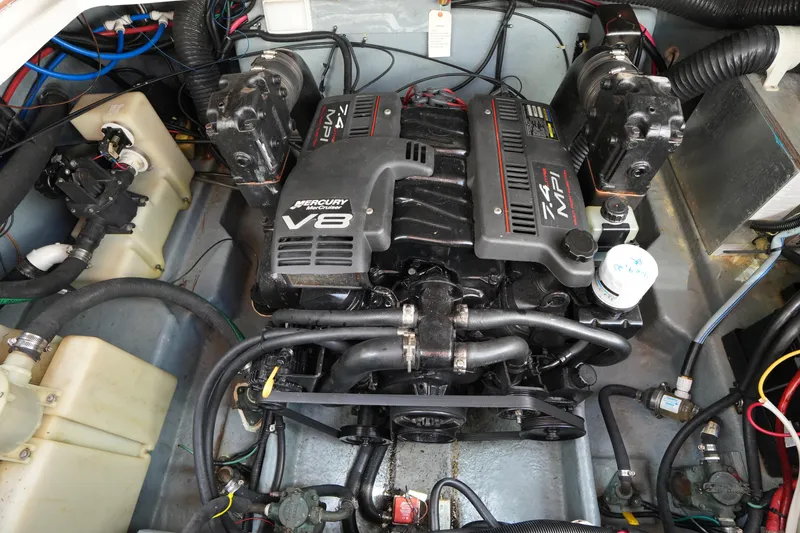 Slide: The Image of Engine compartment of a 2000 Sea Ray 270 Sundancer with a Mercury V8 engine. - 26