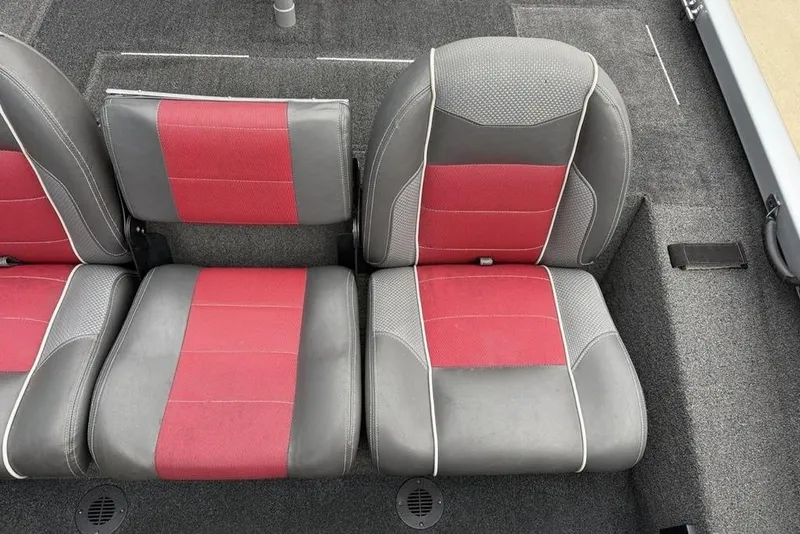Slide: The Image of 2017 Ranger RT188 boat seats with red and gray upholstery. - 14