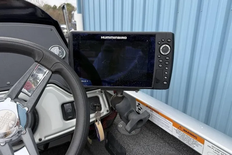 Slide: The Image of 2017 Ranger RT188 boat dashboard with Humminbird Helix 9 fish finder. - 18