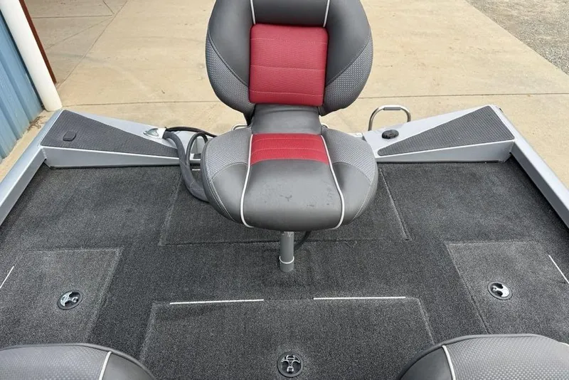 Slide: The Image of 2017 Ranger RT188 boat seat with red and gray upholstery on a carpeted deck. - 20