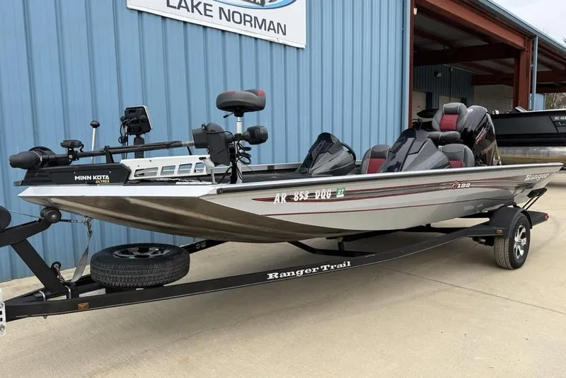 Slide: The Image of 2017 Ranger RT188 fishing boat on trailer, parked outside Lake Norman building. - 7