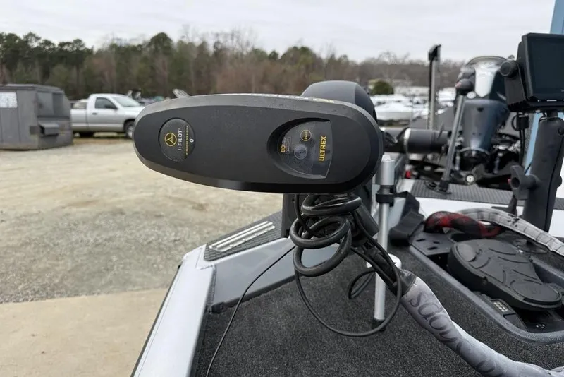 Slide: The Image of 2017 Ranger RT188 boat with Minn Kota Ultrex trolling motor in a parking area. - 8