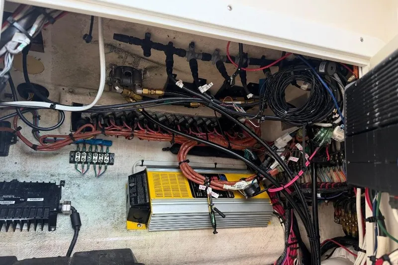 Slide: The Image of Electrical wiring and components inside a 2008 SeaVee 320B boat. - 13