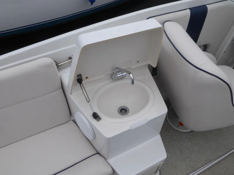 Slide: The Image of Interior of a 2004 Chris-Craft Corsair 25 with sink. - 10