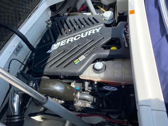 Slide: The Image of 2004 Chris-Craft Corsair 25 engine with Mercury cover. - 17