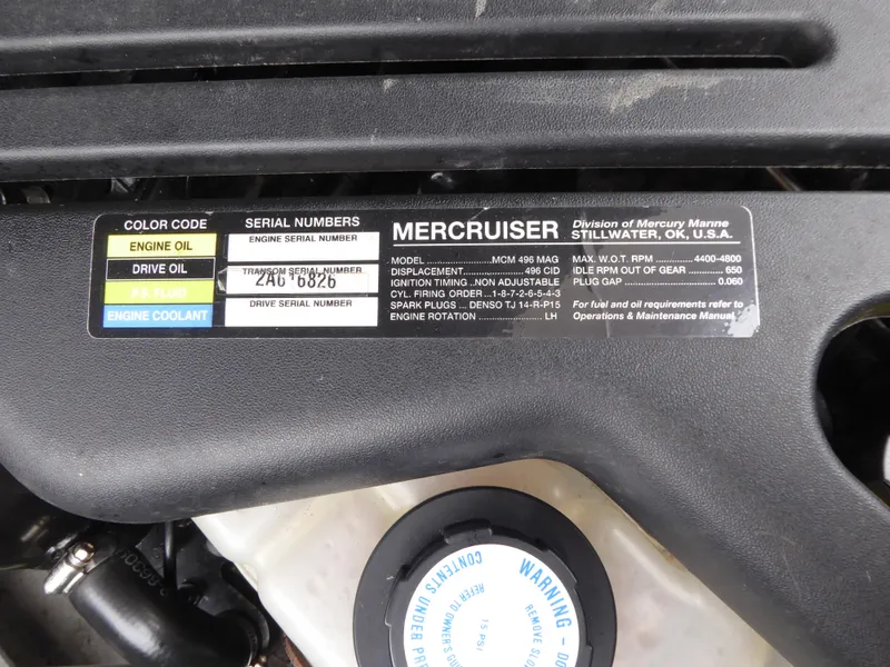 Slide: The Image of Engine label of a 2004 Chris-Craft Corsair 25 boat, showing MerCruiser details. - 19