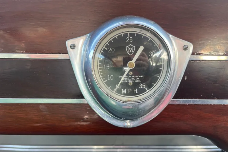 Slide: The Image of 1948 Chris-Craft 24 Sportsman speedometer, vintage design with wooden dashboard. - 13