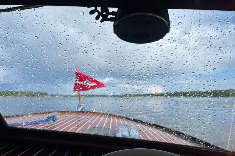 Slide: The Image of Raindrops on windshield of 1948 Chris-Craft 24 Sportsman boat, lake view in background. - 6