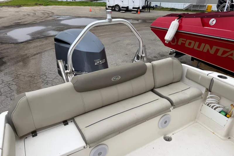 Slide: The Image of 2021 Key West 239 FS boat with Yamaha 250 engine, featuring comfortable seating. - 18
