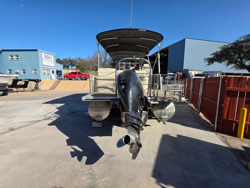 Slide: The Image of Harris FloteBote 250CR 2021 pontoon boat with outboard motor. - 11