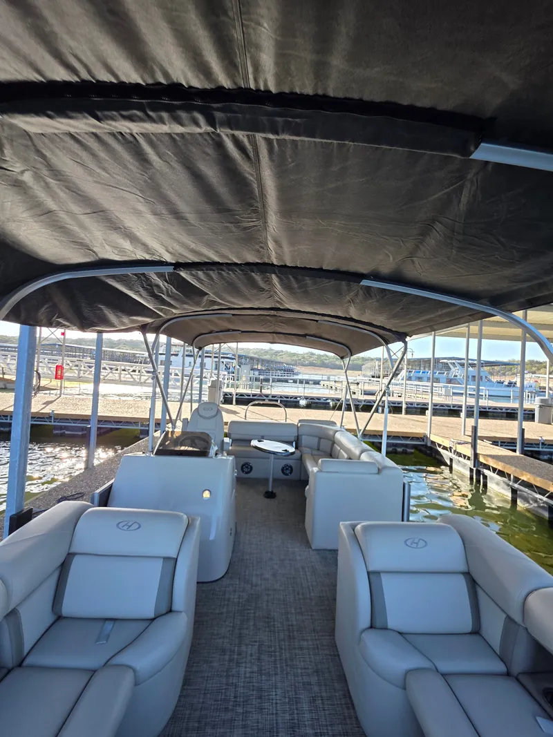 Slide: The Image of Interior view of a 2021 Harris FloteBote 250CR pontoon boat. - 18
