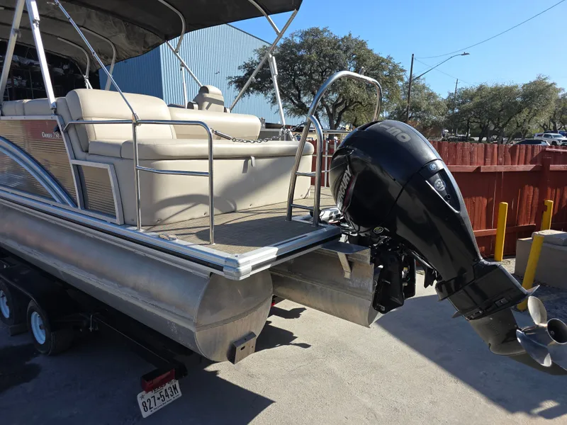 Slide: The Image of 2021 Harris FloteBote 250CR with Mercury engine on trailer. - 3