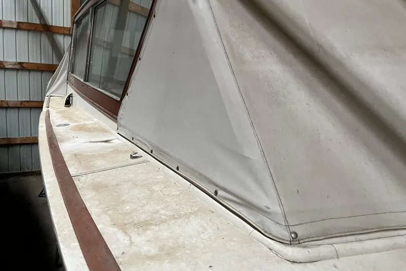 Slide: The Image of 1958 Chris-Craft 31 Sedan Cruiser, side view, showcasing vintage design and cabin details. - 10