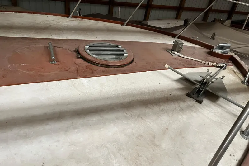 Slide: The Image of 1958 Chris-Craft 31 Sedan Cruiser deck with hatch and anchor in storage. - 11