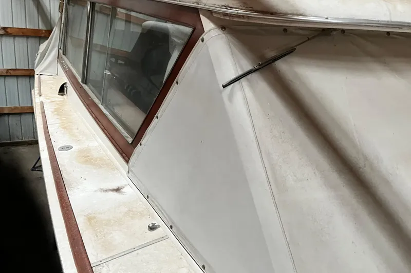 Slide: The Image of 1958 Chris-Craft 31 Sedan Cruiser side view, showcasing vintage design details. - 12