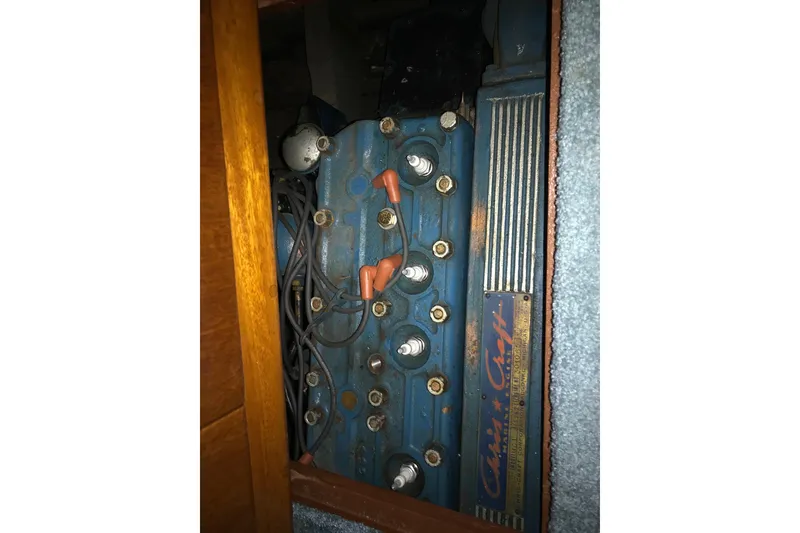 Slide: The Image of 1958 Chris-Craft 31 Sedan Cruiser engine, showcasing vintage mechanical components. - 20