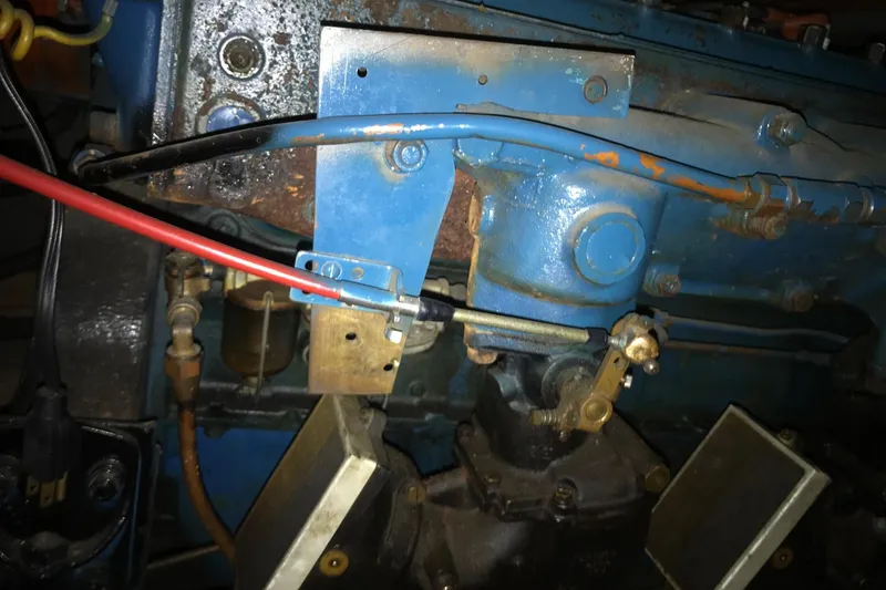 Slide: The Image of 1958 Chris-Craft 31 Sedan Cruiser engine detail with blue and red wiring. - 21