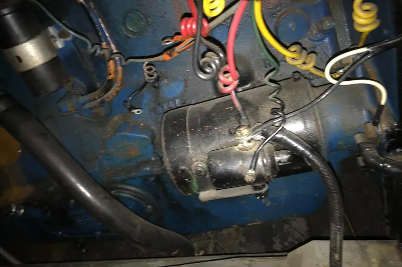 Slide: The Image of Engine wiring of a 1958 Chris-Craft 31 Sedan Cruiser, featuring colorful cables and components. - 22