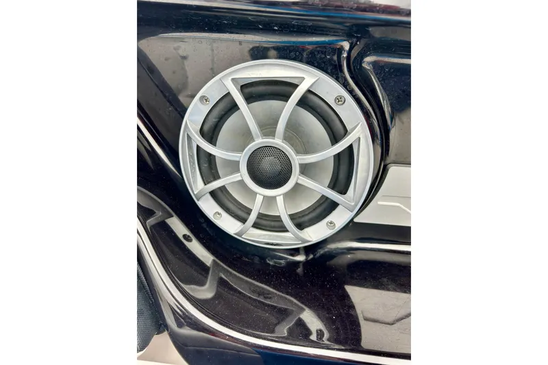 Slide: The Image of Speaker detail on 2018 Yamaha Boats 242X, showcasing sleek design and craftsmanship. - 22