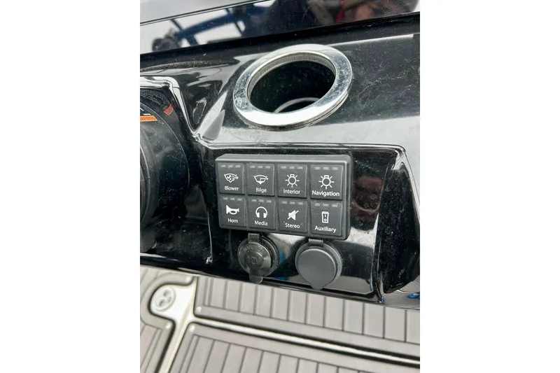 Slide: The Image of Control panel of 2018 Yamaha Boats 242X with various function buttons. - 41