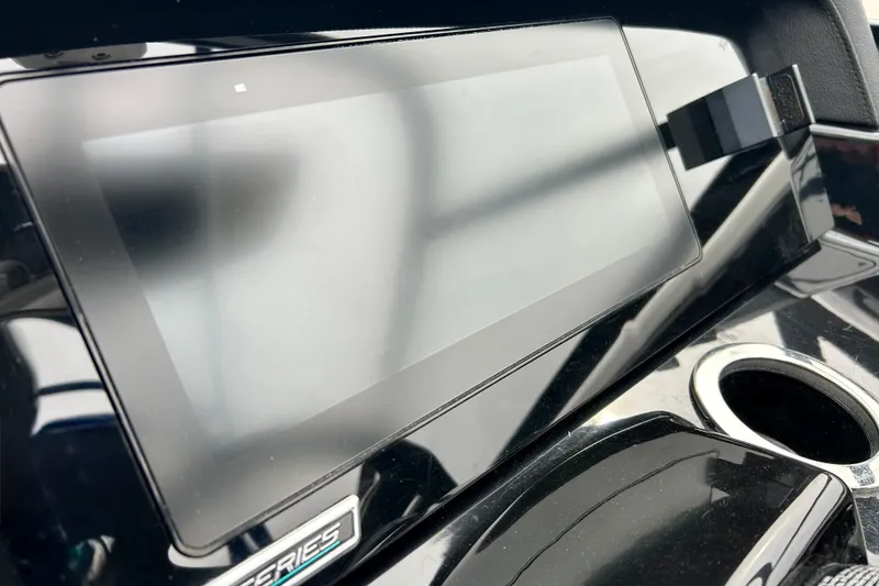 Slide: The Image of Dashboard of 2018 Yamaha Boats 242X with touchscreen display and cup holder. - 43