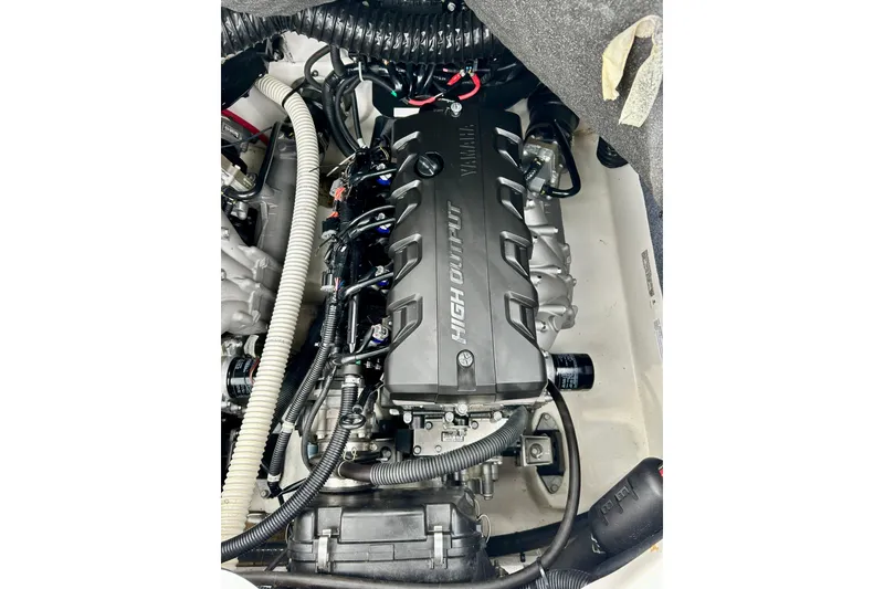 Slide: The Image of 2018 Yamaha Boats 242X engine compartment showcasing high output engine components. - 55
