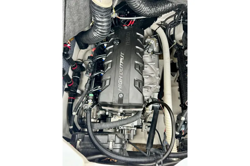 Slide: The Image of 2018 Yamaha Boats 242X high-output engine, detailed view of components and wiring. - 56