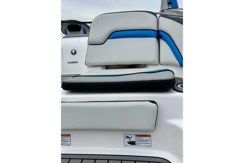 Slide: The Image of 2018 Yamaha Boats 242X interior seating with blue and white upholstery. - 65