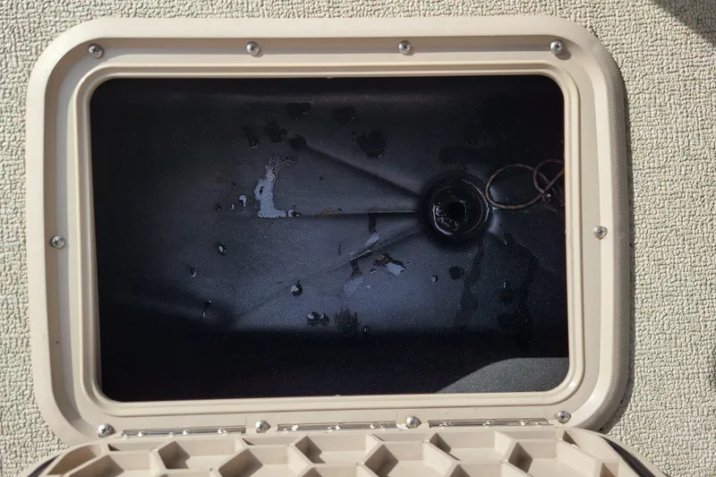 Slide: The Image of Hatch of a 2005 Lowe Fish & Ski 165 boat, showing interior details. - 22