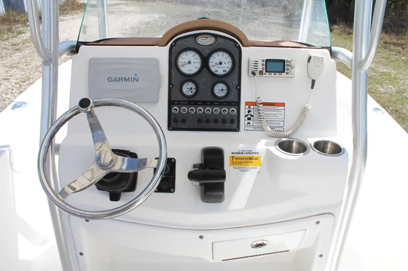 Slide: The Image of 2016 Sea Fox 186 Commander boat dashboard with Garmin GPS and control panel. - 12