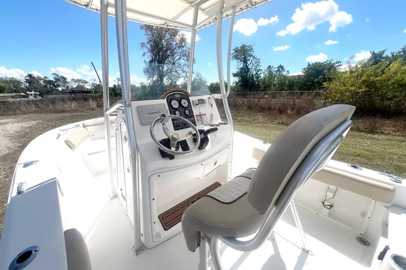 Slide: The Image of 2016 Sea Fox 186 Commander boat interior with steering console and seating. - 13