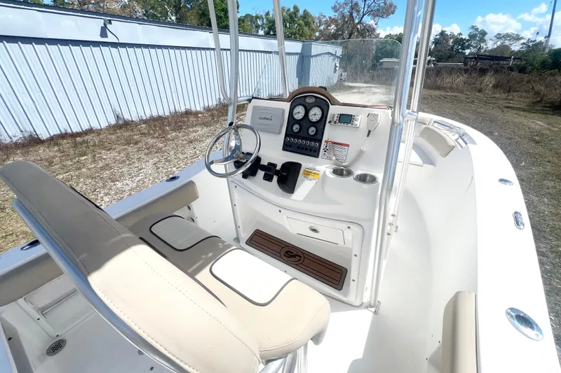Slide: The Image of 2016 Sea Fox 186 Commander boat interior with steering console and seating. - 14