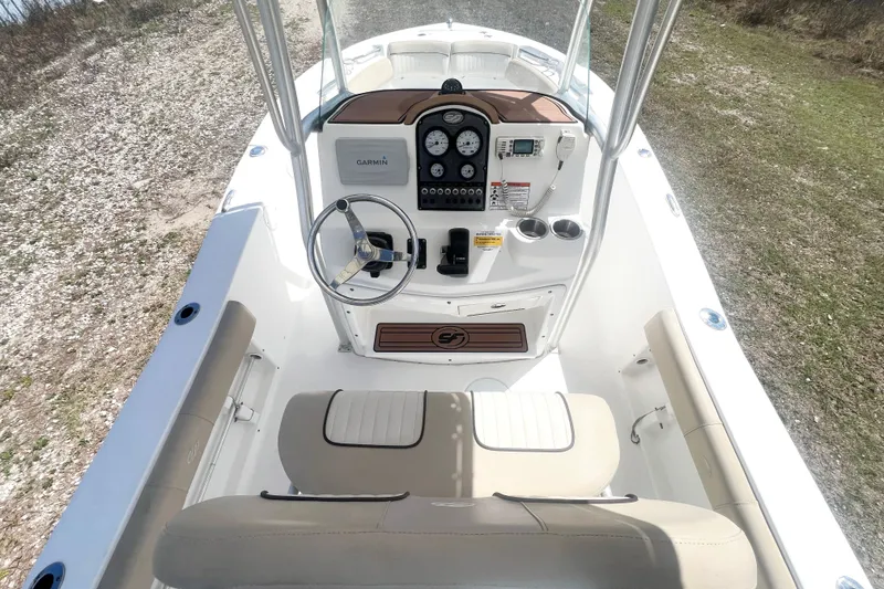 Slide: The Image of 2016 Sea Fox 186 Commander boat interior with steering wheel and control panel. - 15