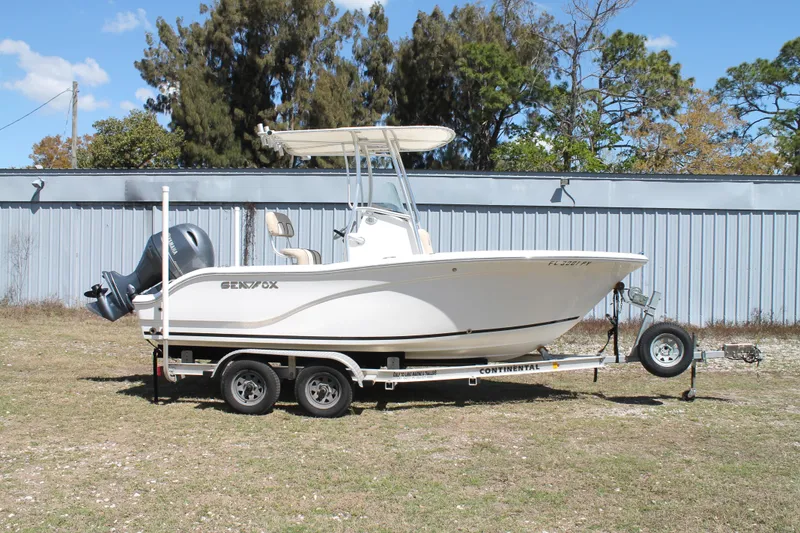 Slide: The Image of 2016 Sea Fox 186 Commander boat on trailer, parked outdoors. - 3