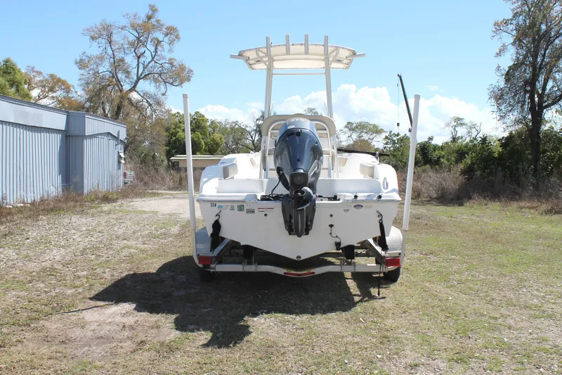 Slide: The Image of 2016 Sea Fox 186 Commander boat on trailer, rear view, outdoors. - 4