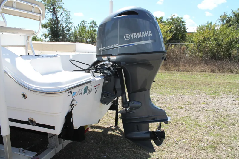 Slide: The Image of 2016 Sea Fox 186 Commander boat with Yamaha outboard motor on grassy area. - 7