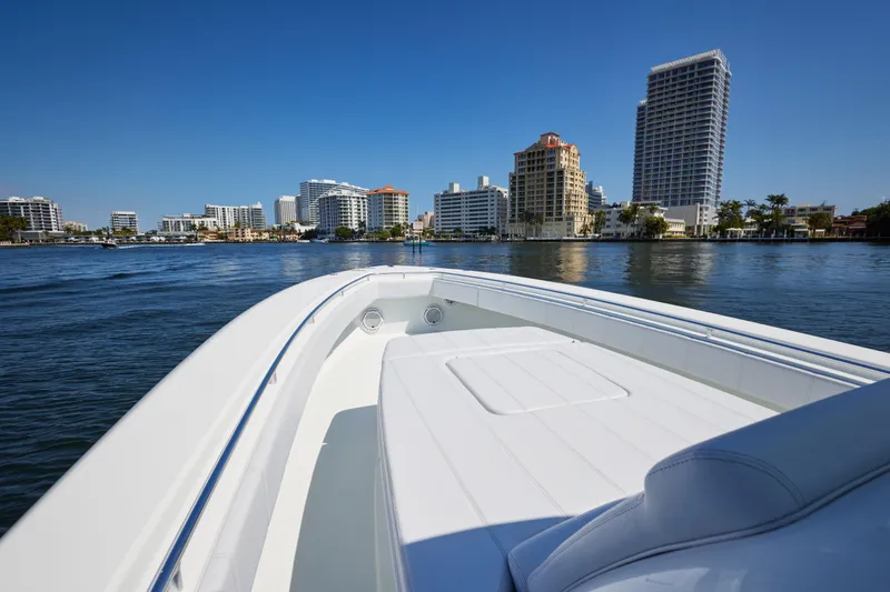 Slide: The Image of 2022 Contender 44 Fisharound cruising near city skyline on a sunny day. - 10