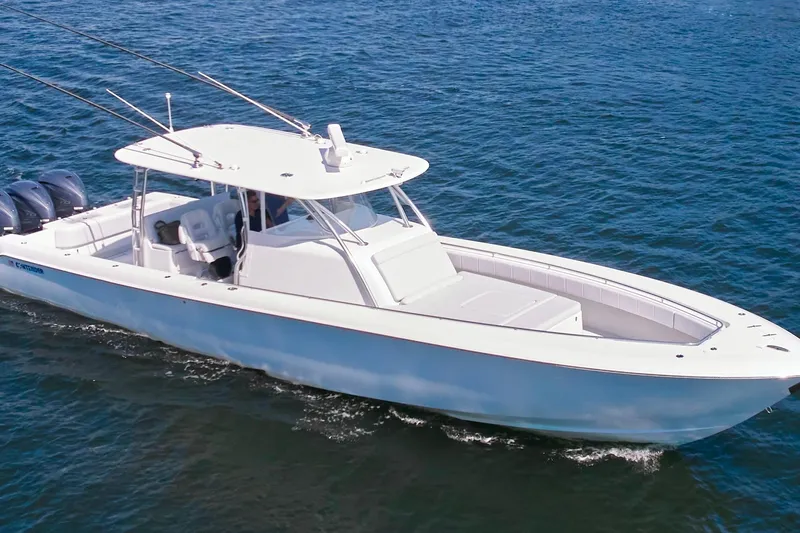 Slide: The Image of 2022 Contender 44 Fisharound boat cruising on open water. - 9