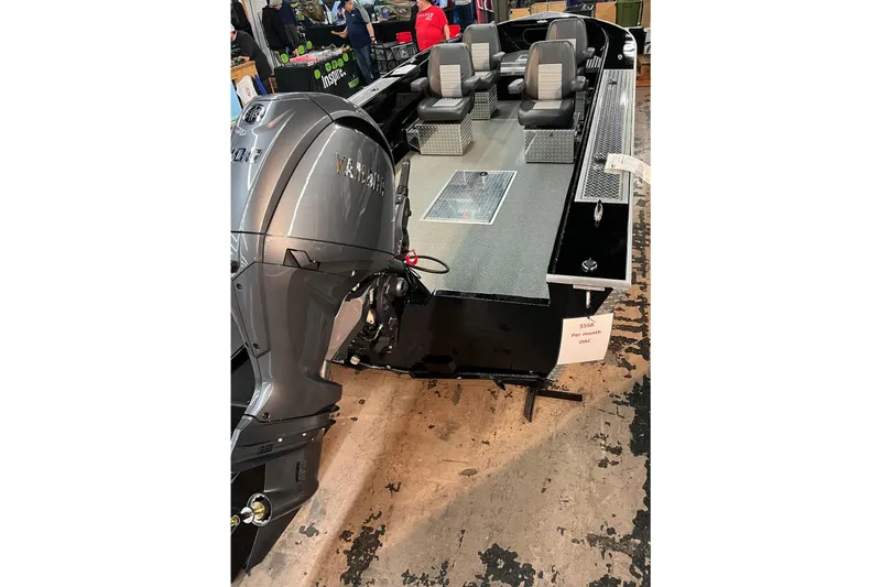 Slide: The Image of Interior of 2026 RH Boats 23 Commander, featuring seating and storage compartments. - 4