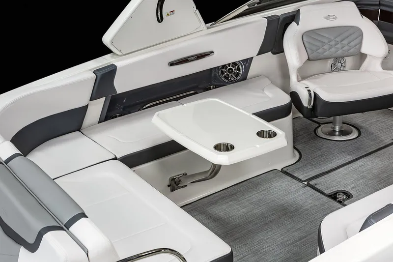 Slide: The Image of Manufacturer Provided Image: 2021 Chaparral 307 SSX boat interior with seating and table. - 8