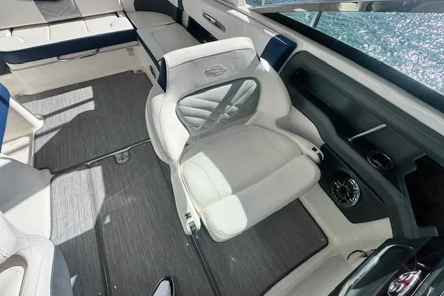 Slide: The Image of Interior of 2021 Chaparral 307 SSX boat with luxurious seating and modern design. - 9