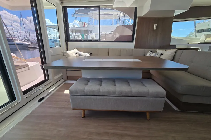 Slide: The Image of Modern interior of 2023 Bali CATSPACE yacht with spacious seating and table. - 17