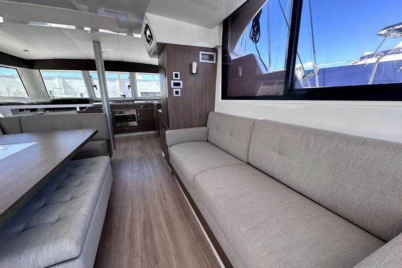 Slide: The Image of Modern interior of 2023 Bali CATSPACE catamaran with spacious seating and large windows. - 20