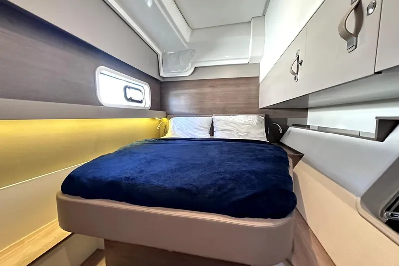 Slide: The Image of Luxurious cabin interior of 2023 Bali CATSPACE yacht with cozy bed and modern design. - 31