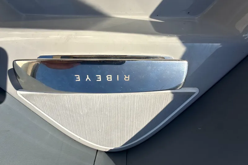 Slide: The Image of Interior view of a 2022 Ribeye HFM model storage compartment with equipment. - 12