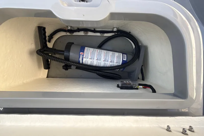 Slide: The Image of Open storage compartment on 2022 Ribeye HFM boat, showcasing spacious interior design. - 6