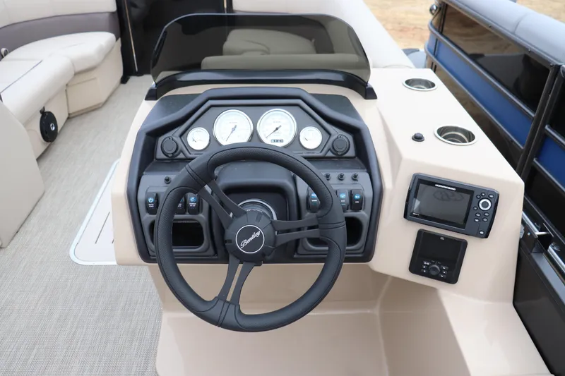 Slide: The Image of 2026 Bentley Pontoons Legacy 223 Cruise dashboard with steering wheel and control panel. - 5