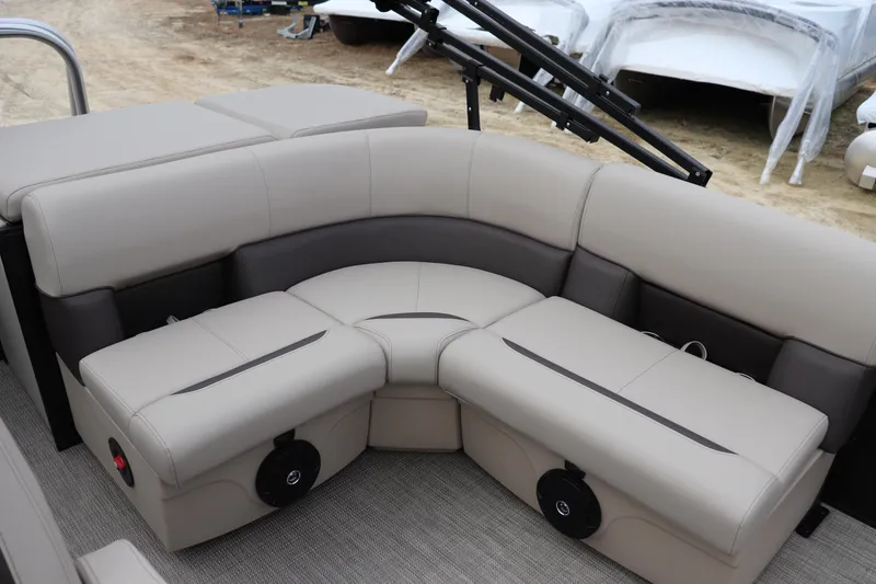 Slide: The Image of 2026 Bentley Pontoons Legacy 223 Cruise interior seating with beige and gray upholstery. - 7