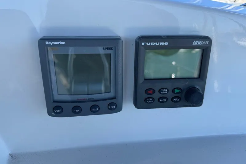 Slide: The Image of Raymarine and Furuno navigation displays on 2008 Kadey-Krogen 44 Walk Around yacht. - 12